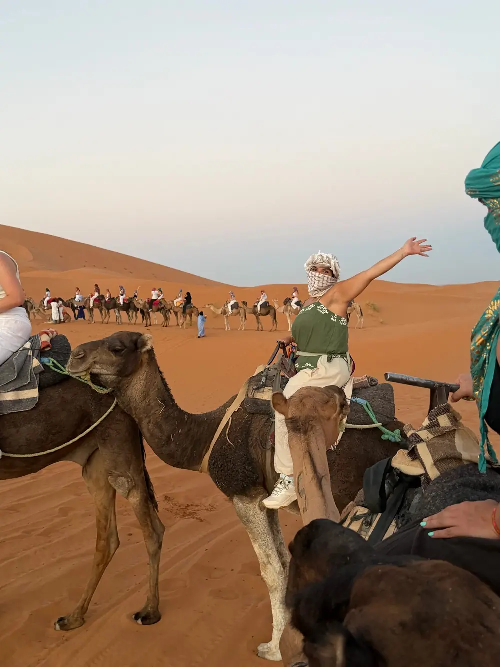Our desert camp in Erg Chebbi Camel caravan with Morocco Zaino travellers in the Sahara dunes
